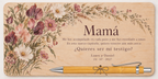 Placa impressa a cores com flores silvestres, o texto Mamá e esferográfica de bambu